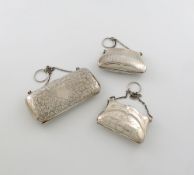 A small collection of three silver purses, comprising: one by W. Haseler, Birmingham 1914,