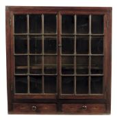 An early 19th century mahogany and oak hanging display cabinet, inlaid stringing with shell paterae,