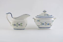 A Nantgarw sugar basin and cover with milk jug, c.1818-20, simply decorated with cornflower sprigs