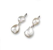 A pair of natural pearl drop earrings, each earring comprising two baroque shaped pearls, joined