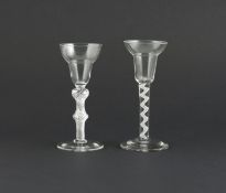 Two pan-topped wine glasses, mid 18th century, one raised on a double-knopped airtwist stem, the