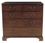 A late George III mahogany chest, the applied moulded edge top above two short and three long