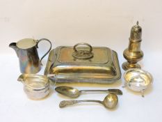 A Georgian silver cream jug, a William IV silver ladle, a silver sugar bowl and sifter, a silver
