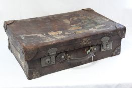 An early 20th century tan leather suitcase fitted chrome twin-lever locks, 27