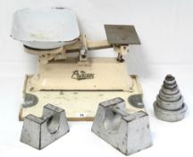 A ‘Princess’ cream painted cast-iron counter-top scale to weigh 28lbs., mounted on tray base,