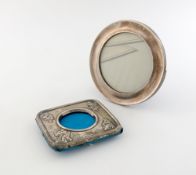 An Edwardian silver photograph frame, by Lister and Haden, Birmingham 1905, rectangular form,