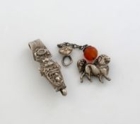 A Chinese silver belt clasp, marked with Chinese characters, shaped vase form, embossed with figures