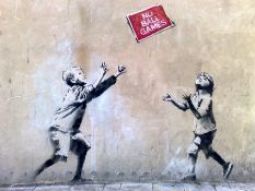 The graffiti artwork ‘No Ball Games’ by the British street artist Banksy