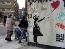 As the rat is his signature stencil, the Girl with the Red Balloon is Banksy's most popular art