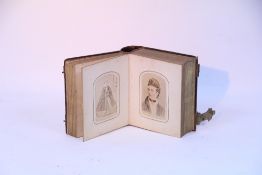 A late 19th/early 20th century leather-bound Brown’s Self-Interpreting Family Bible; together with