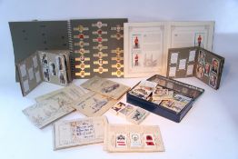 A pair of Swift “Saratoga MK II” 8 x 40mm field glasses, with case; a stoneware footwarmer; a