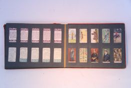 A 1940s Hadrill & Horstmann “Roller” counterpoise desk lamp (crimson).