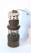 A Thomas & Williams brass “Manager” miner’s lamp, 8
