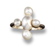 A natural pearl set gold ring, of cruciform design and set with five pearls in yellow gold.