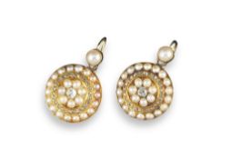 A pair of 19th century diamond and seed pearl cluster earrings, each circular earring is centred
