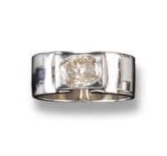 A diamond solitaire ring, the oval shaped diamond weighs approximately 1.60cts and is rub-over set