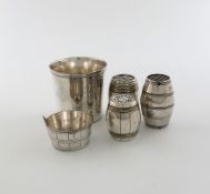 A mixed lot of electroplated items, comprising: a Victorian barrel salt pot, inscribed `SALT`, two