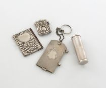A mixed lot of silver items, various dates and makers, comprising: a Victorian aide memoire, by