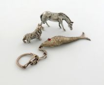 A modern miniature silver model of a horse, London 1977, modelled in a standing position, length