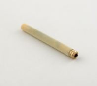 ? A 19th century gold and ivory cased sewing stiletto, cylindrical form, length open 9cm.