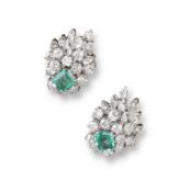A pair of emerald and diamond cluster earrings, each centred with a square shaped emerald, and
