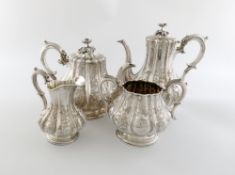 A four-piece Victorian silver tea and coffee set, by Elkington and Co, Birmingham 1857, lobed