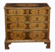 A William and Mary oyster veneered and marquetry chest of drawers, circa 1690, rectangular top
