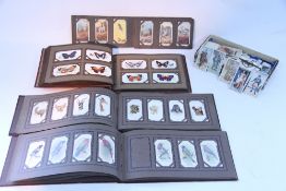 A pair of Swift “Saratoga MK II” 8 x 40mm field glasses, with case; a stoneware footwarmer; a