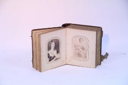 A tan leather Gladstone-type bag.