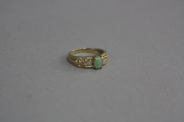 A 9CT DIAMOND AND JADE RING, ring size K