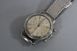 A STAINLESS STEEL BREITLING 'TOP TIME' WRISTWATCH, missing secondary hands (not working)