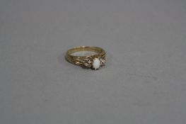 A 9CT OPAL AND DIAMOND RING, ring size S