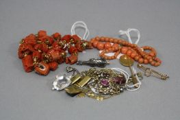 A QUANTITY OF COSTUME JEWELLERY, to include early 20th Century paste set necklaces and a coral