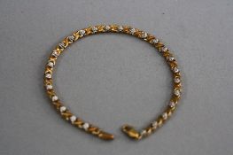 A 9CT DIAMOND BRACELET, approximate length 18cm