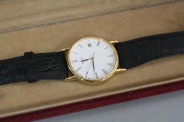 A 9CT SEIKO GENT WATCH, on a leather strap (in original box)