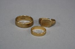 A COLLECTION OF RINGS, one plain polished court shaped band measuring approximately 7.3mm in