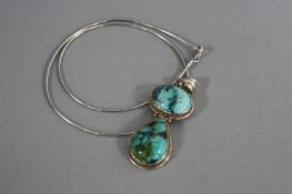 A SILVER TURQUOISE NECKLACE