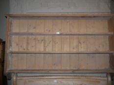 A pine rack of three tiers