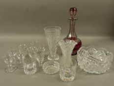 A ruby flashed decanter, clear glass custard cups, whiskey tumblers, cut glass fruit bowl,