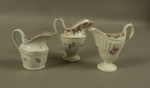 Three Newhall cream jugs, with pattern number 149,