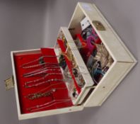 A jewellery box containing mixed costume jewellery