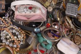 A quantity of costume jewellery including bangles, necklaces, chains, earrings,