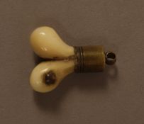 A 19th century Stanhope set in a Stag's tooth viewing German waterfalls and scenes with base metal