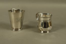 Two silver christening mugs, of tapered and baluster outline, both engraved with initials,