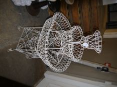 A wirework planter of circular outline