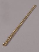 A neckchain of hammered belcher links in 9ct gold, approximate length 51cm,
