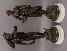 A pair of resin figures of farmer and farm girl (damaged)