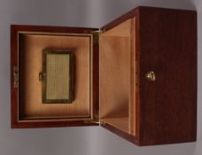 A modern hardwood humidor with initialled led plaque to the lid