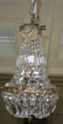 A prismatic drop basket chandelier with gilt metal frame