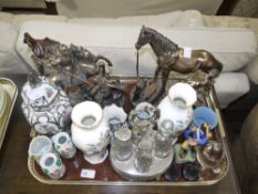 Two resin bronzed groups of a blacksmith and horse and St George and the dragon,